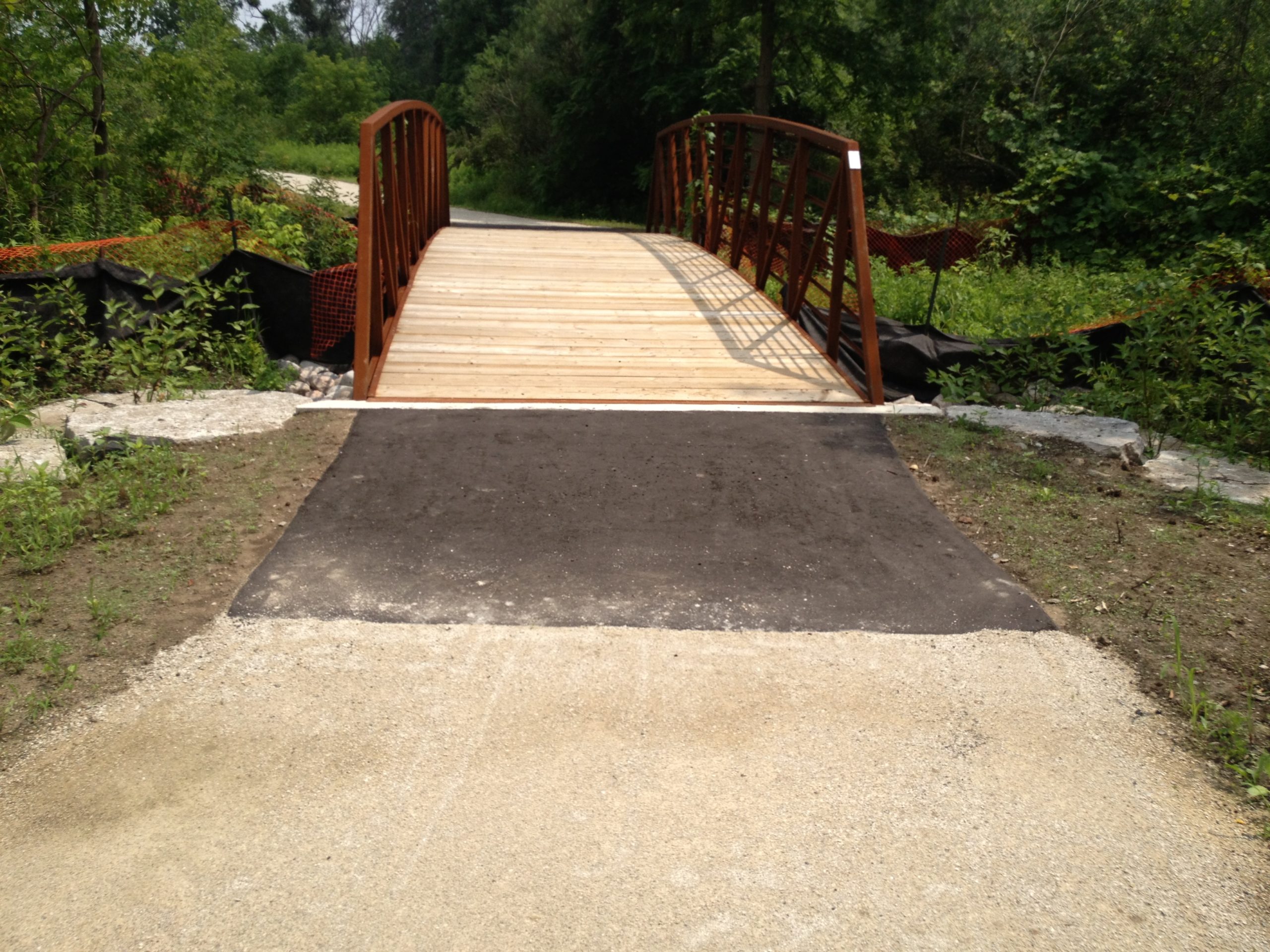 Gravel walkway leading to bridge