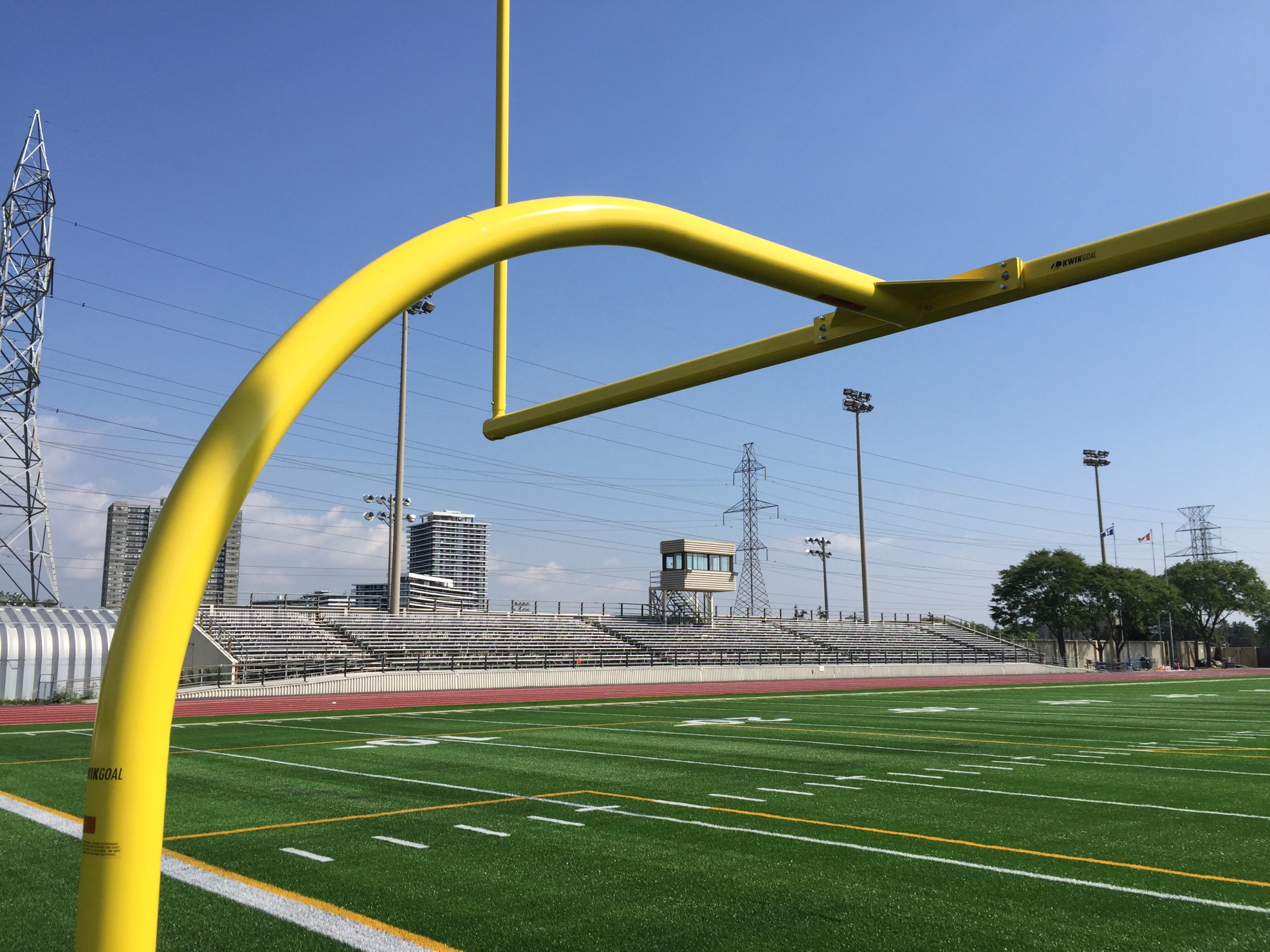 Yellow football goal post.