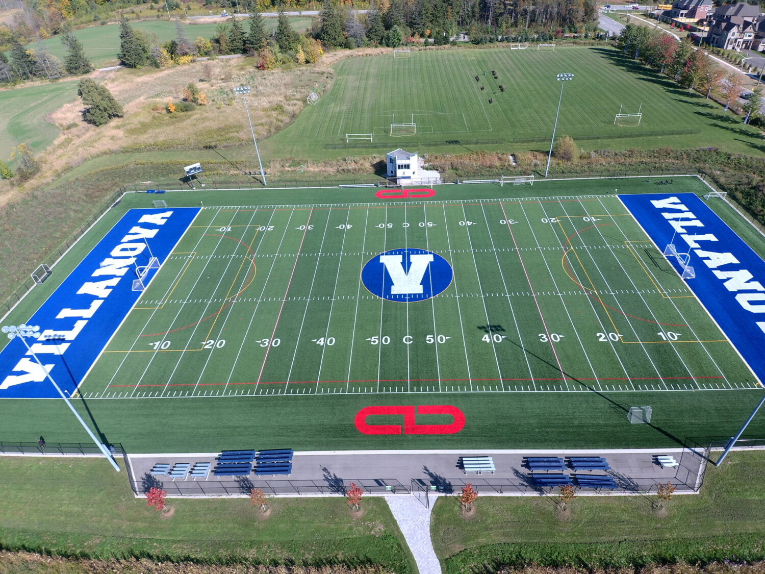 Birds eye view of soccer field with giant VILLANOVA branding on either end built into the field.