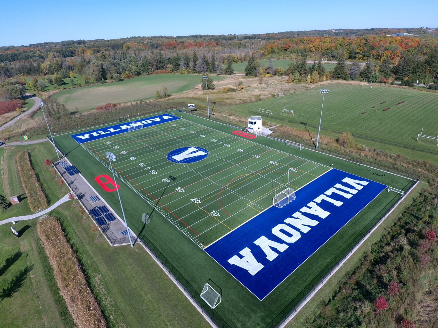 Birds eye view of soccer field with giant VILLANOVA branding on either end built into the field.