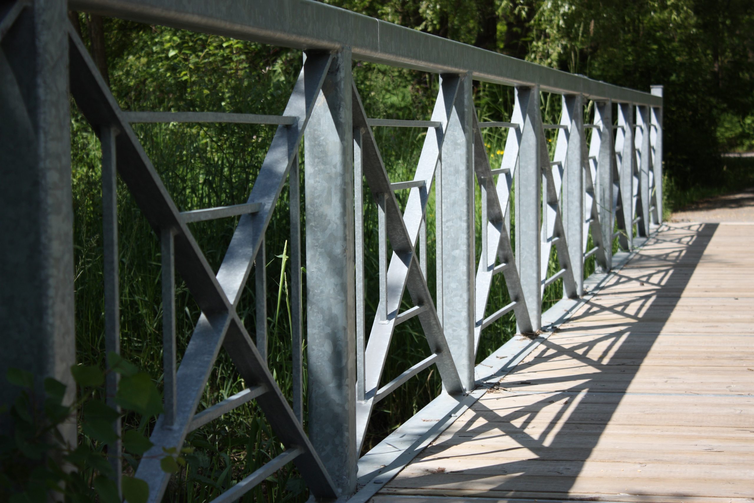 Close up shot of metal railing on bridge