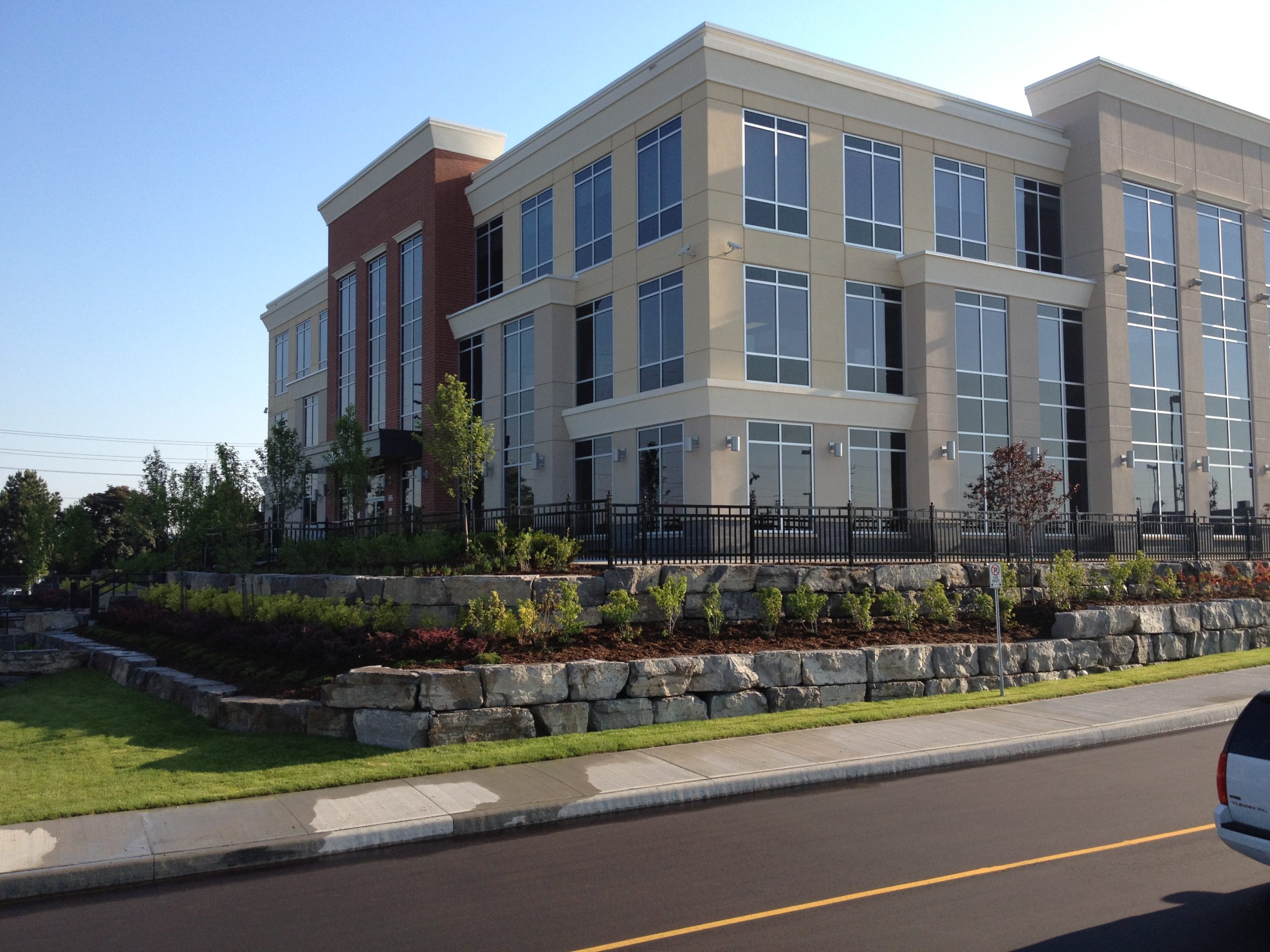 Layers of gardens in front of building